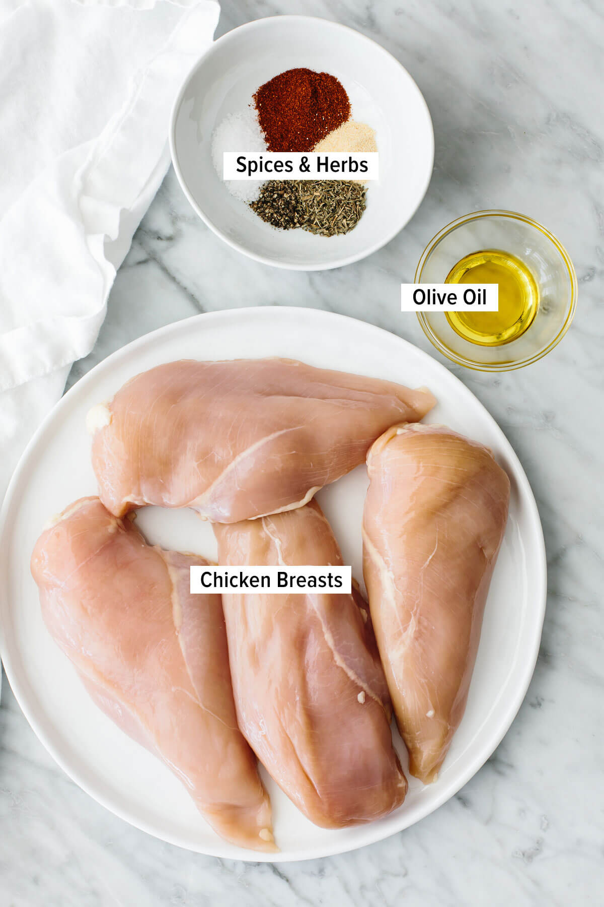 The best oven baked chicken recipe with juicy, tender, and extremely flavorful chicken breasts! It's an easy and healthy dinner that also works great for meal prep! Ingredients for oven baked chicken breasts.