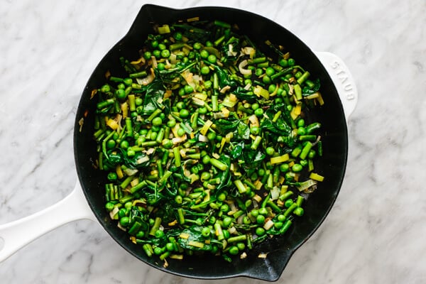 Sauteeing vegetable for spring vegetable frittata.