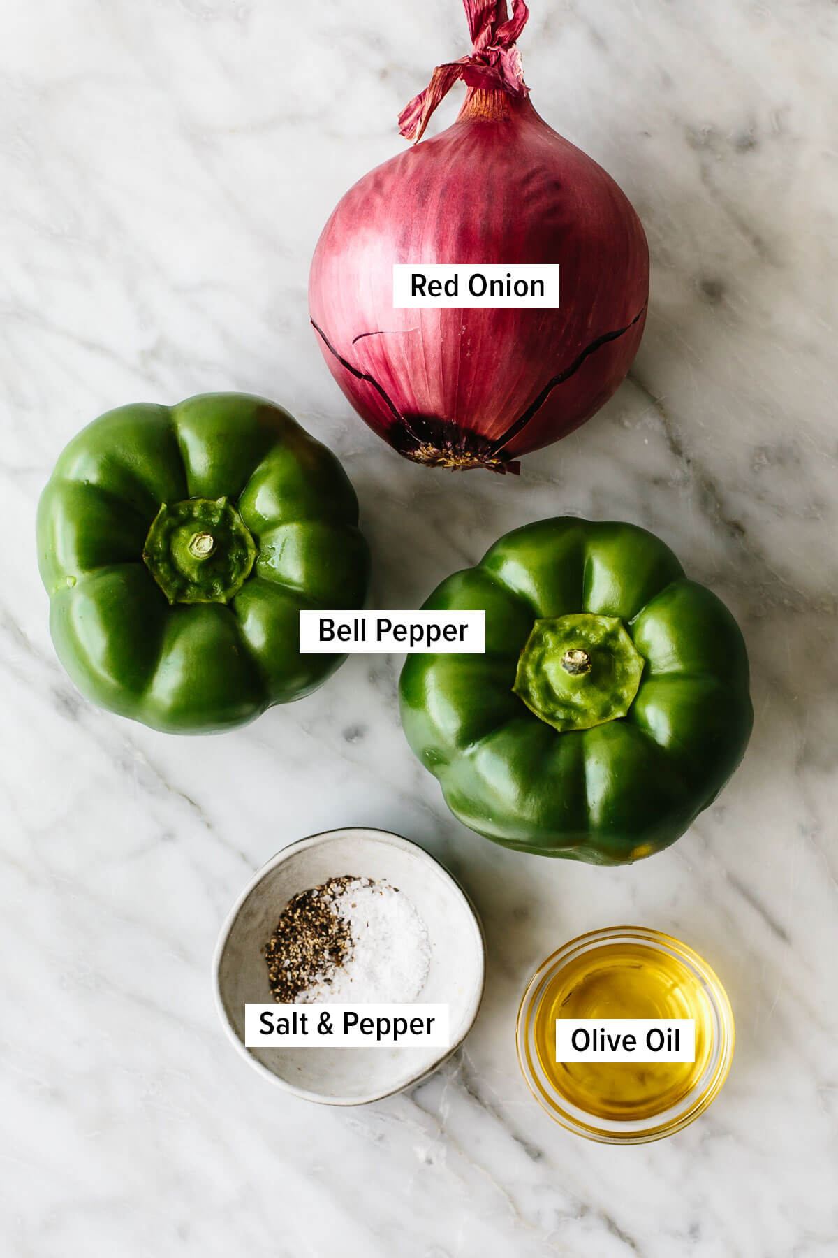 Ingredients for fajita veggies on a table.