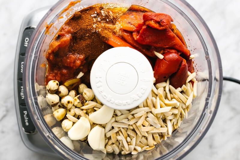 Blending romesco sauce in a food processor