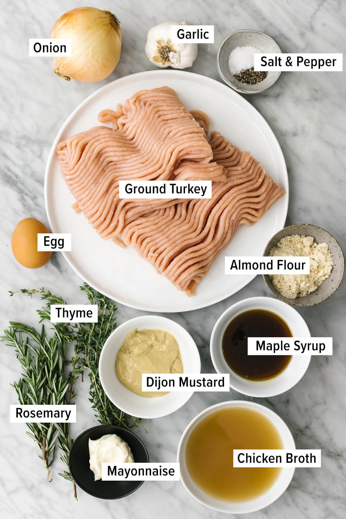 This healthy turkey meatball recipe is simmered in a delicious maple mustard sauce. Perfect for an easy dinner idea and cozy fall recipe! Ingredients for turkey meatballs on a table