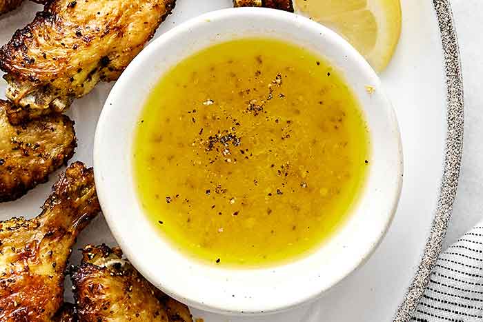 Step three of making air fryer chicken wings: make lemon butter sauce.