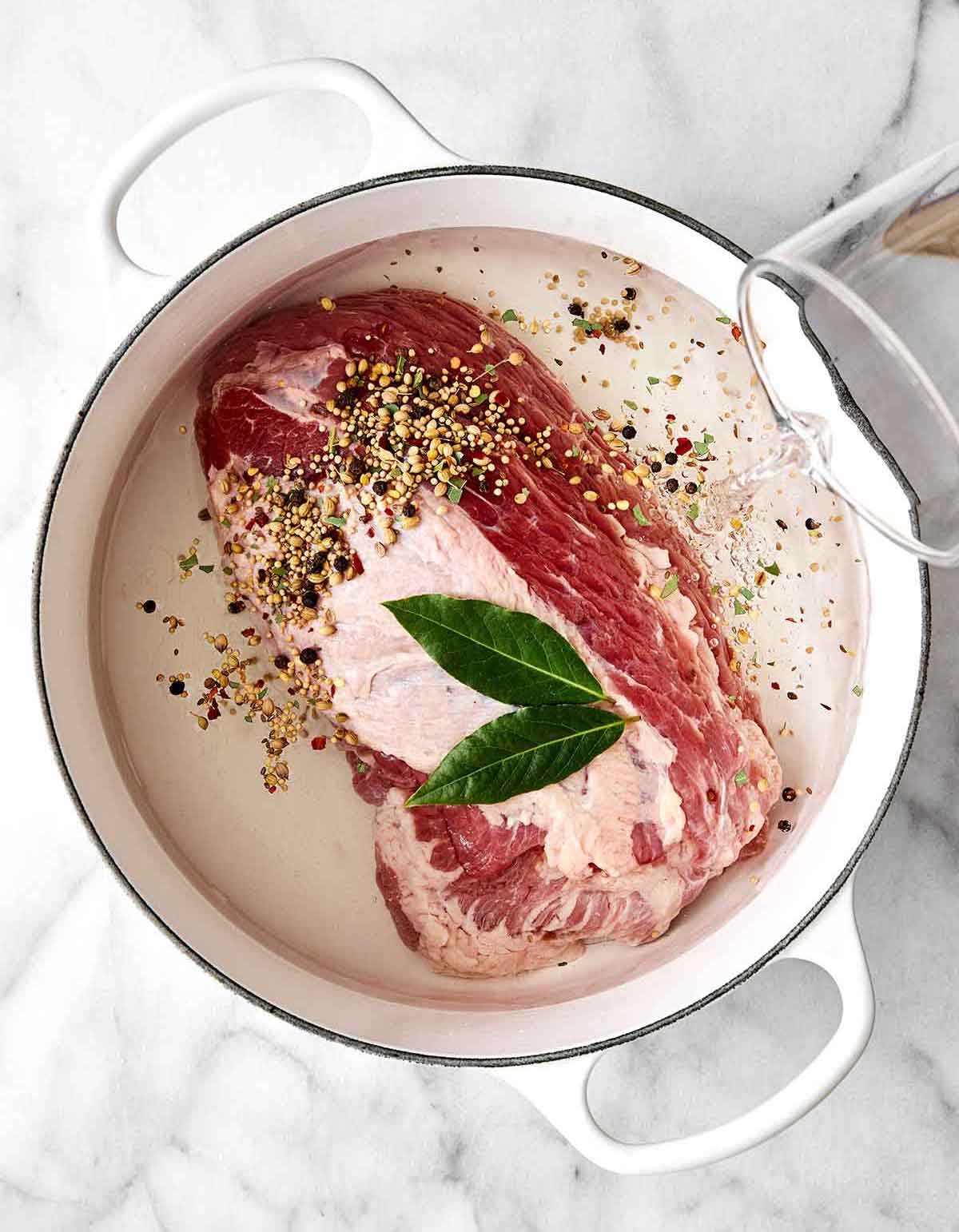 Step one of corned beef and cabbage: Cook the meat.