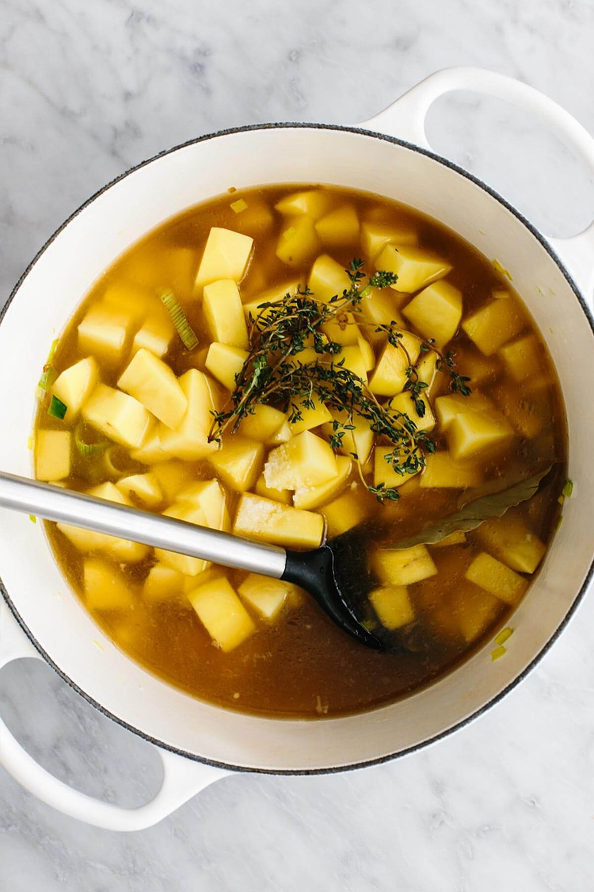 Cooking potatoes in a pot.