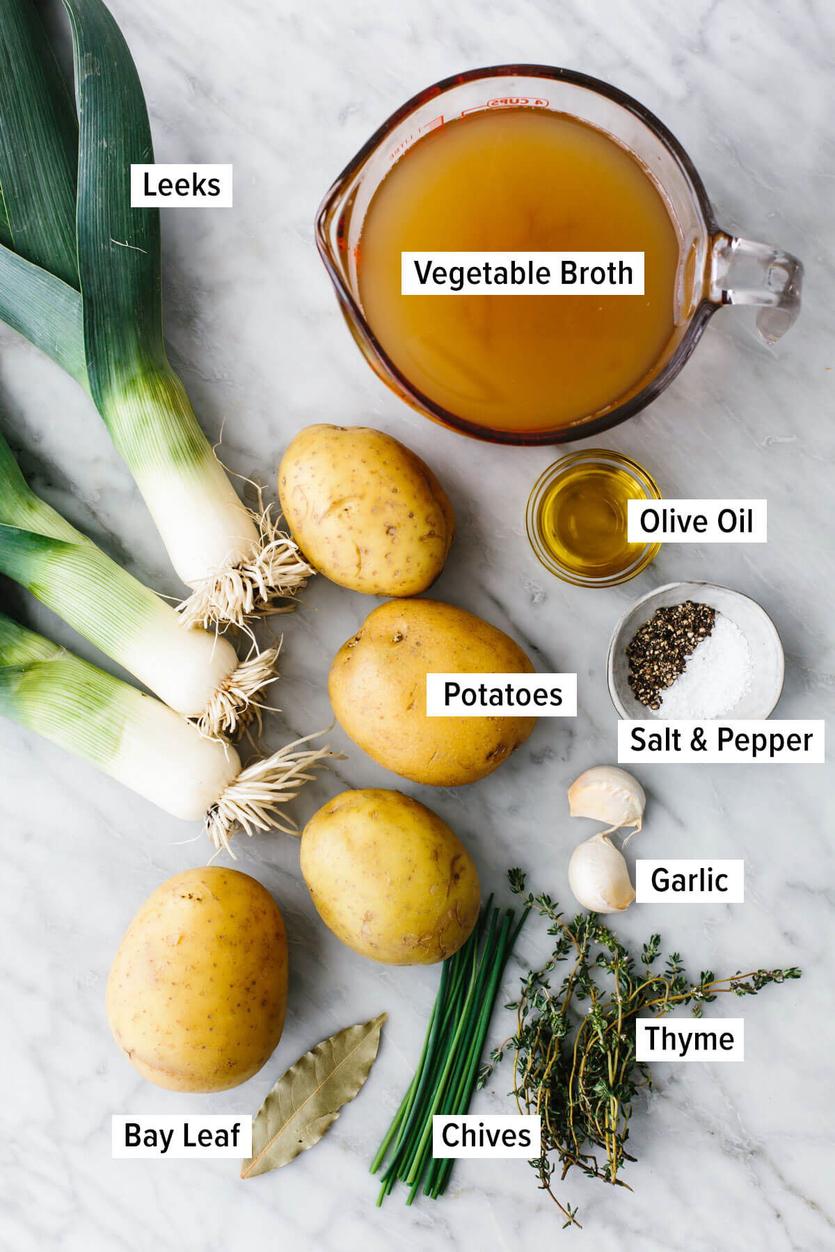 Ingredients for potato leek soup on a table