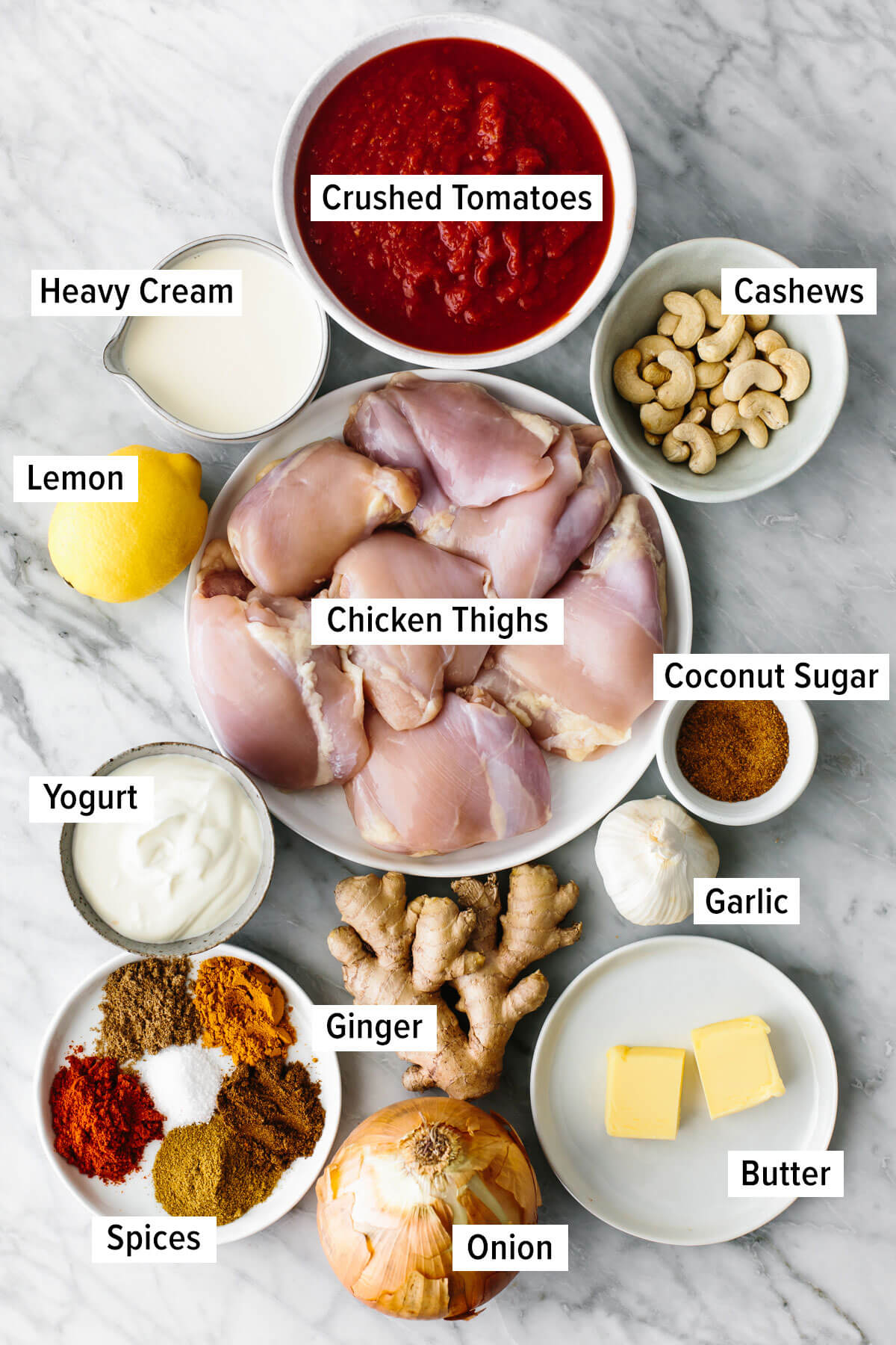 This butter chicken recipe is Indian comfort food at its best - with juicy spiced chicken tossed in a rich and velvety curry sauce. Ingredients for butter chicken on a table
