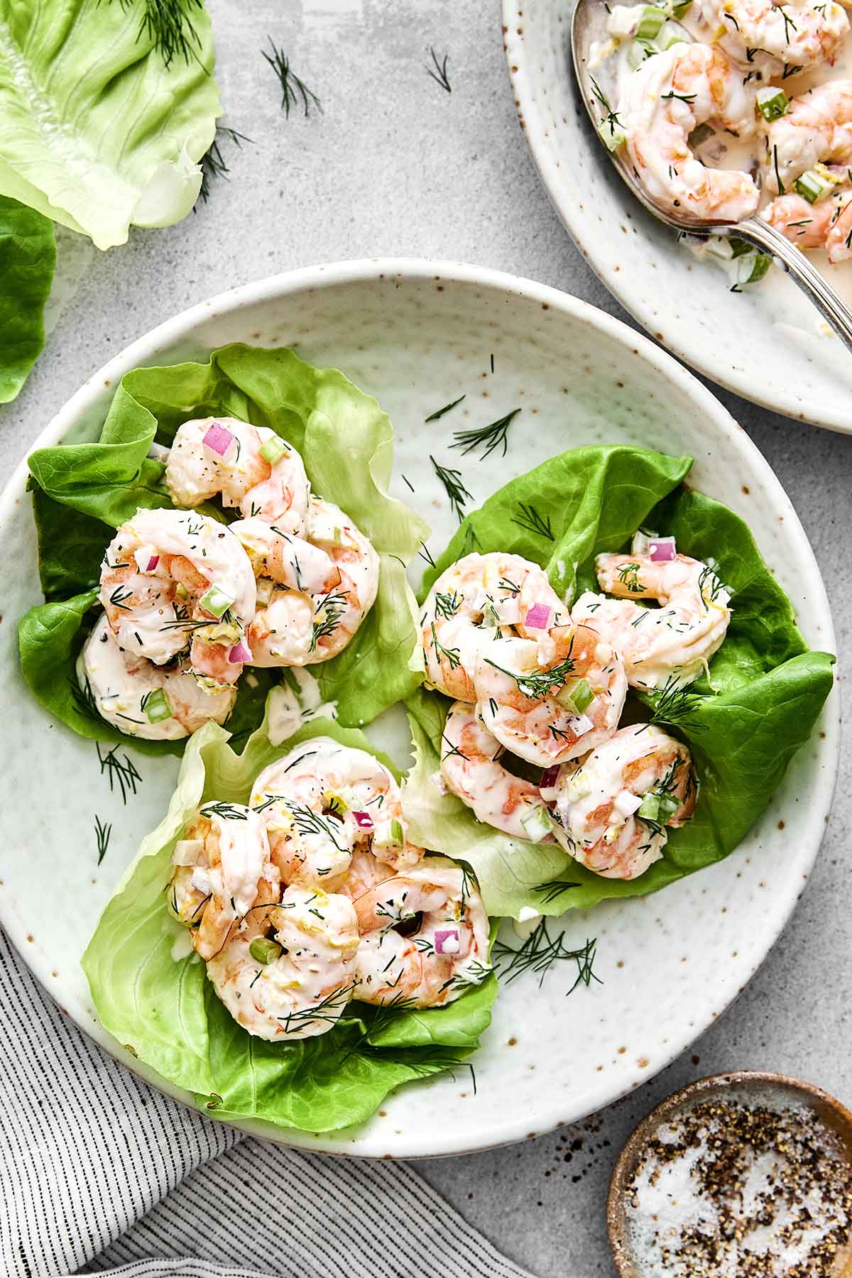 Shrimp salad on lettuce leaves.