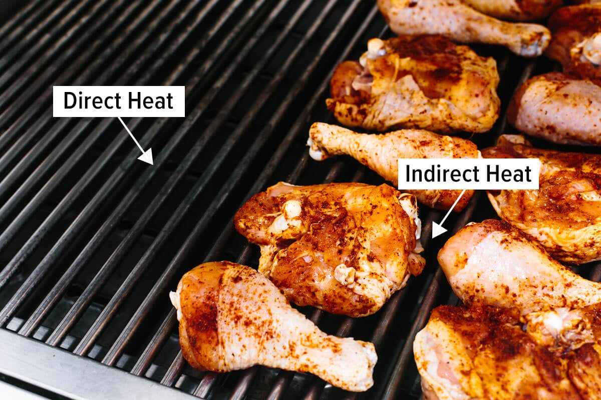 This BBQ chicken is insanely juicy, perfectly charred, and glistening with my secret homemade BBQ sauce. Perfect for your summer cookout! A grill with BBQ chicken