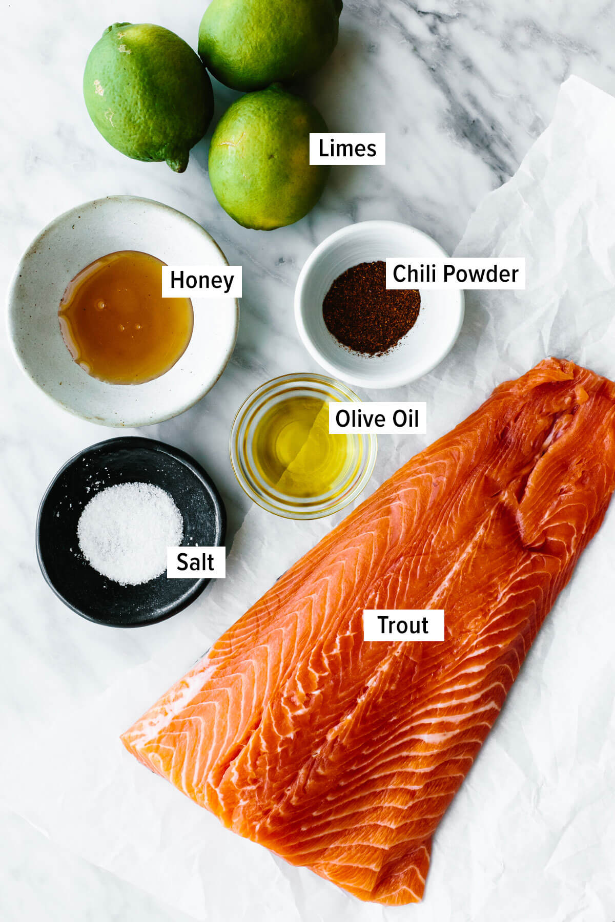 Ingredients for chili lime trout on a table