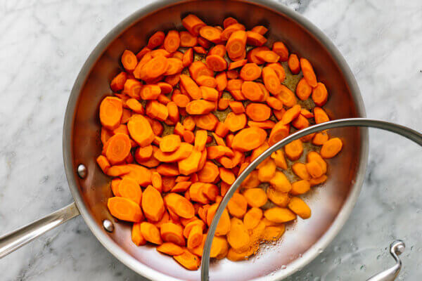 Sauteed carrots in a pan