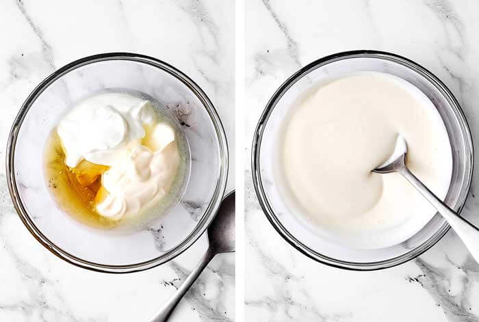 Mixing dressing in a glass bowl.