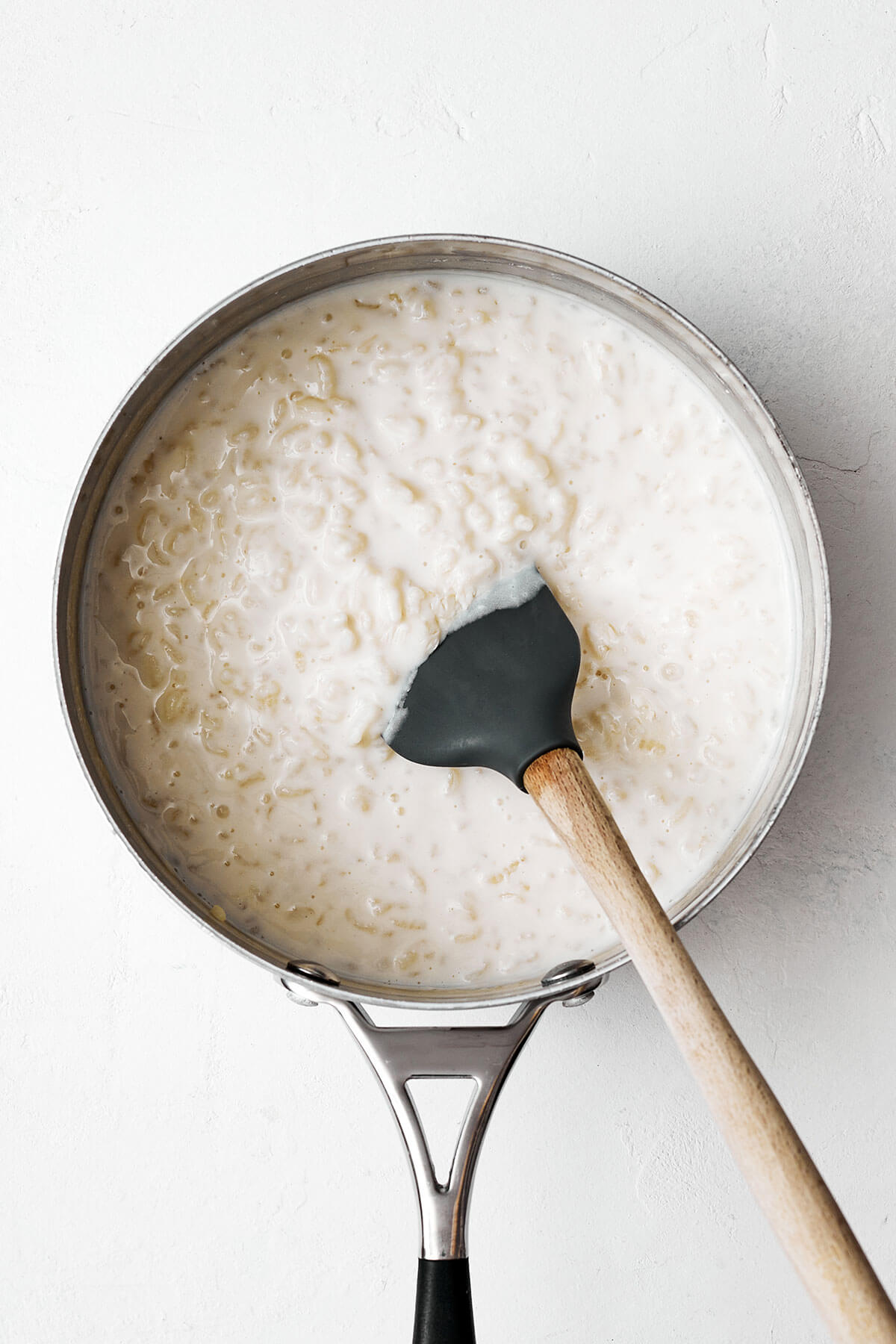 Cooking rice pudding in a pot