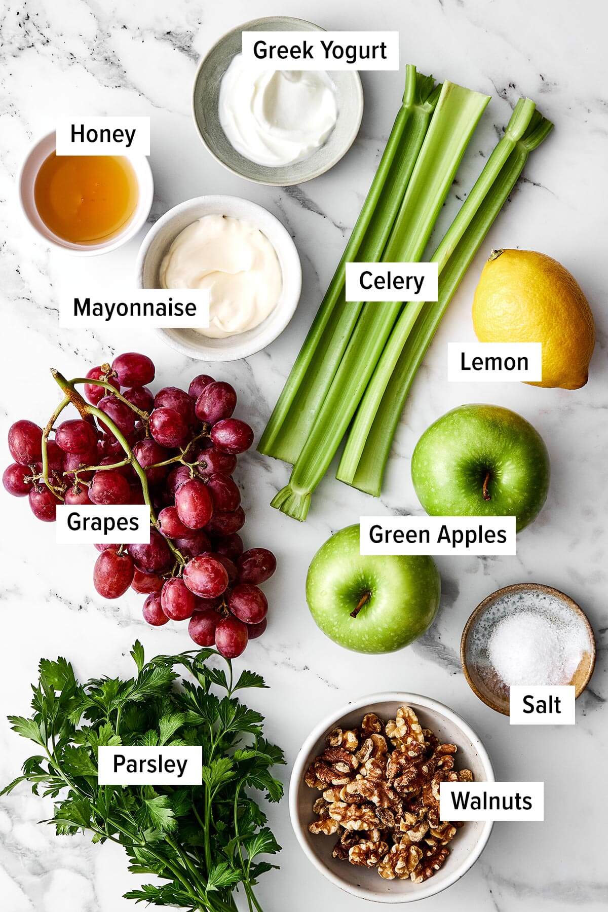 Everyone will love this classic Waldorf salad for holiday dinners! It's crisp, refreshing, and tossed in the best creamy dressing. Ingredients for a classic Waldorf salad.
