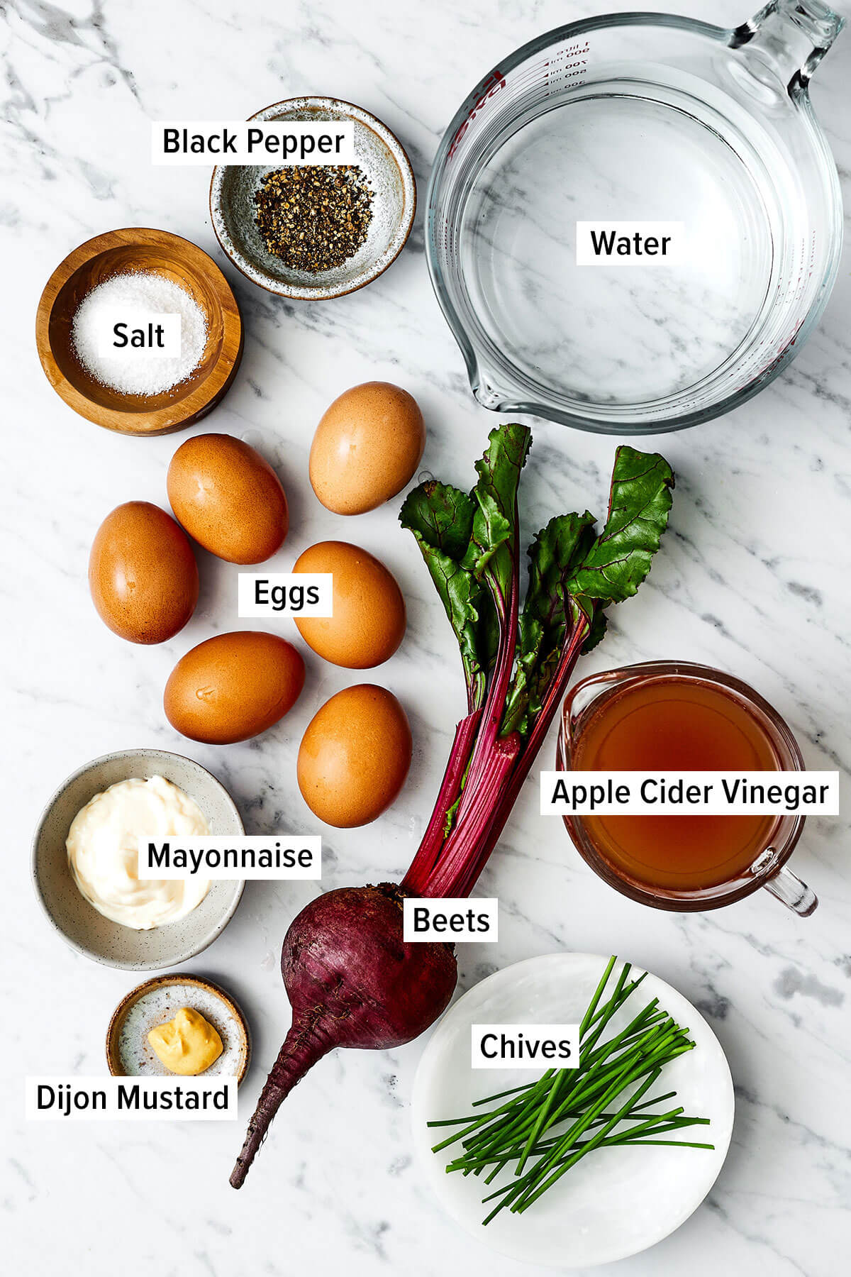 Ingredients for beet pickled deviled eggs on a table