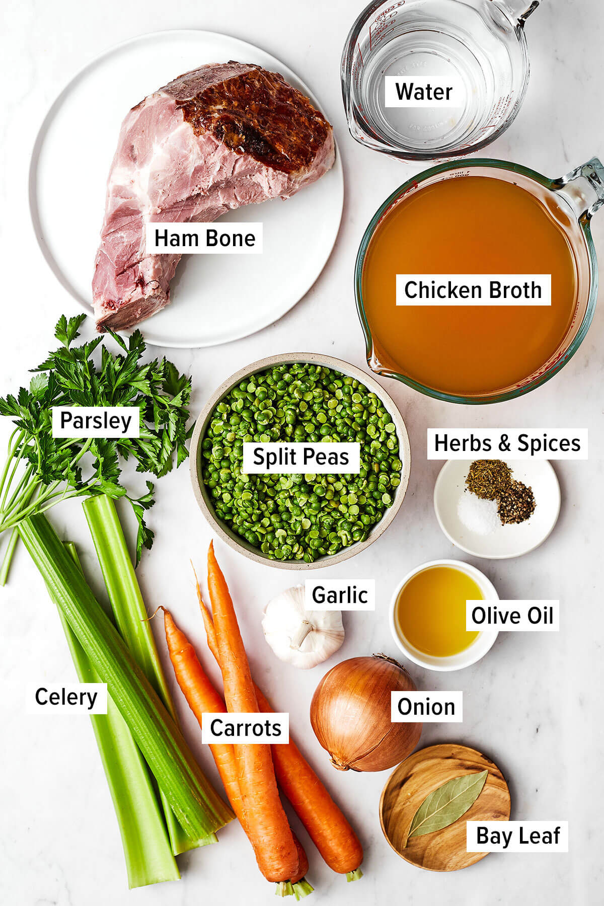This split pea soup made with a ham bone is the best leftover ham recipe from the holidays! Ingredients for split pea soup on a table