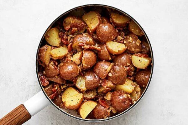 A pot filled with German potato salad