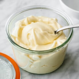 Mayonnaise in a glass storage jar.