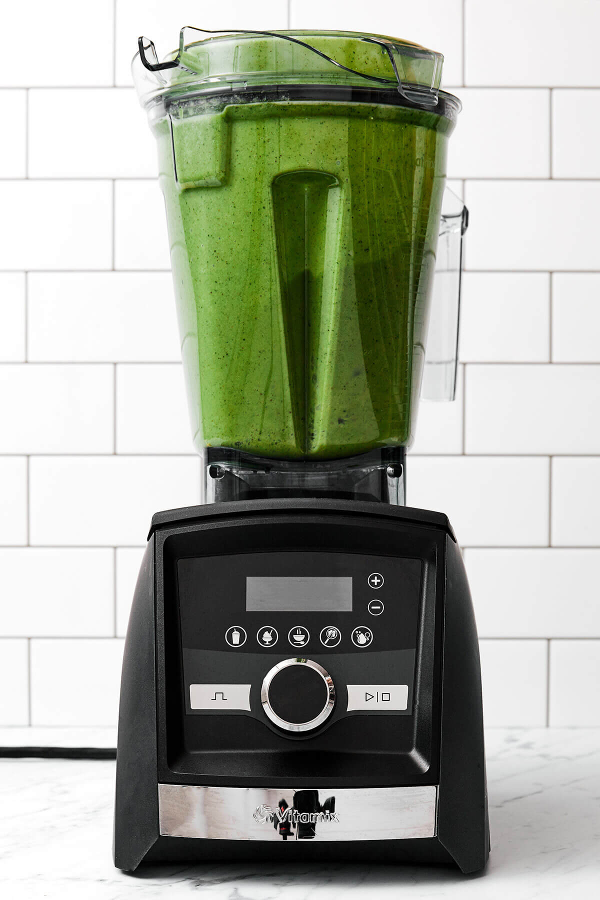 Blending cilantro smoothie