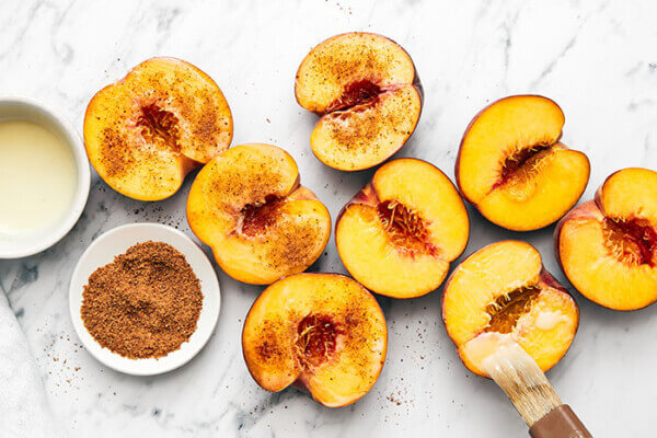 Sliced peaches sprinkled with sugar