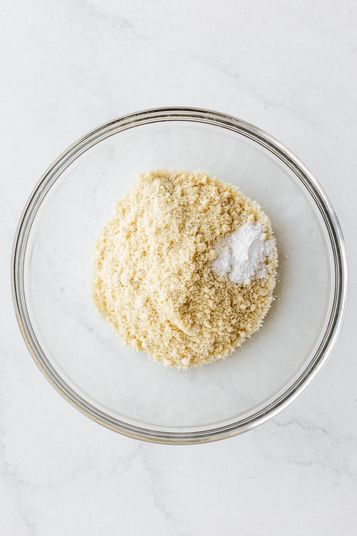 Dry almond cake ingredients in a bowl