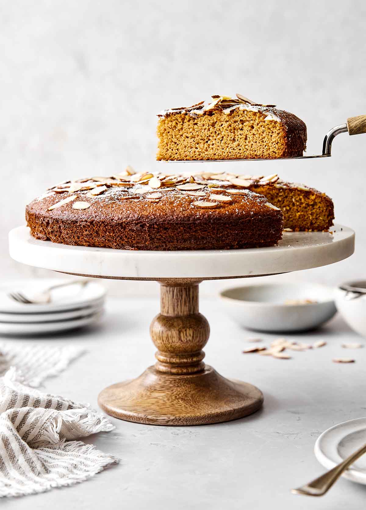This almond cake is the perfect dessert for any occasion. Serve it plain for afternoon tea or top it with cream and fruit for the holidays! Almond cake recipe.