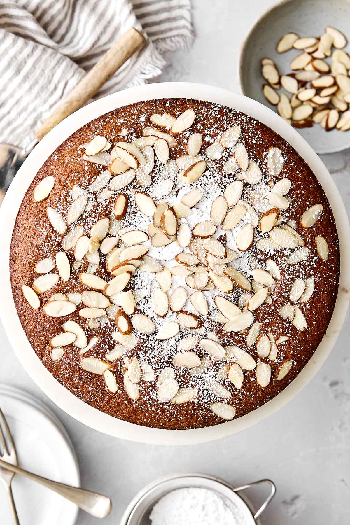 This almond cake is the perfect dessert for any occasion. Serve it plain for afternoon tea or top it with cream and fruit for the holidays! Almond cake.