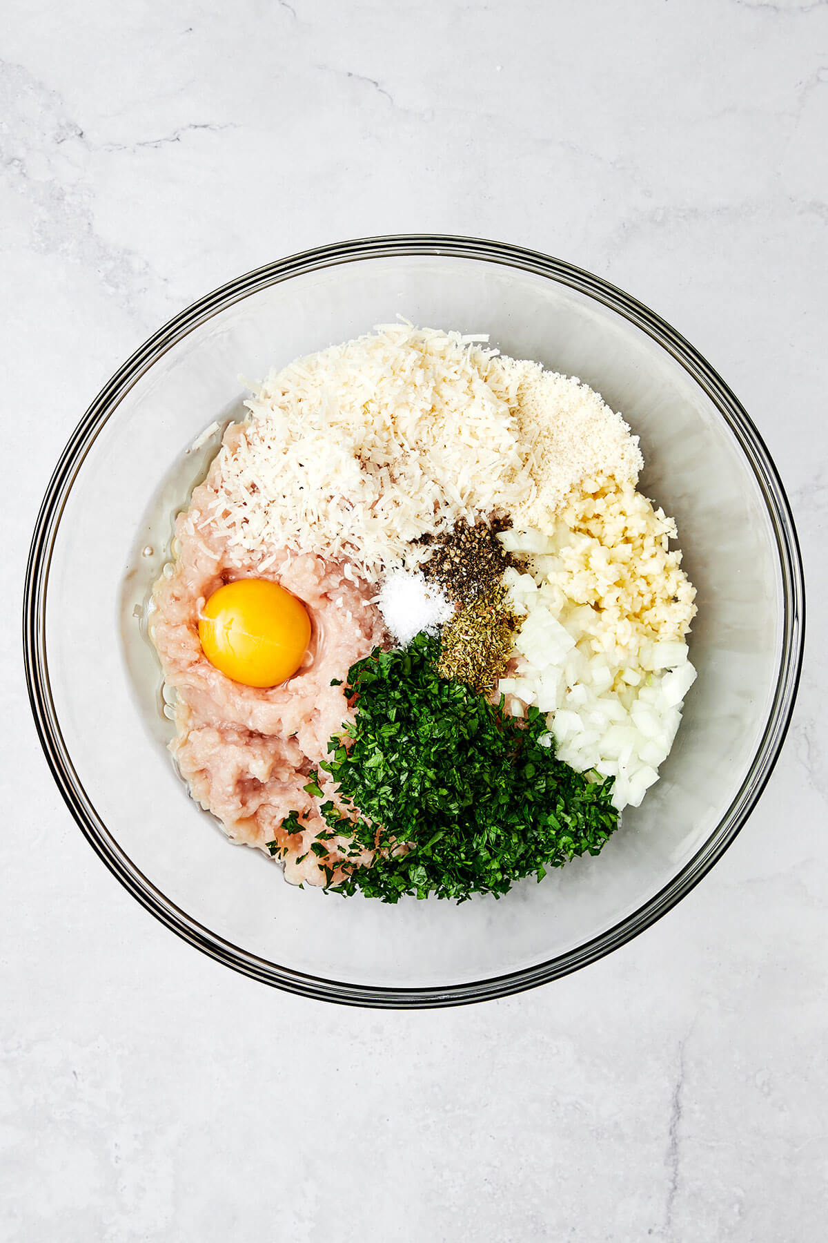 Chicken meatball ingredients in a bowl