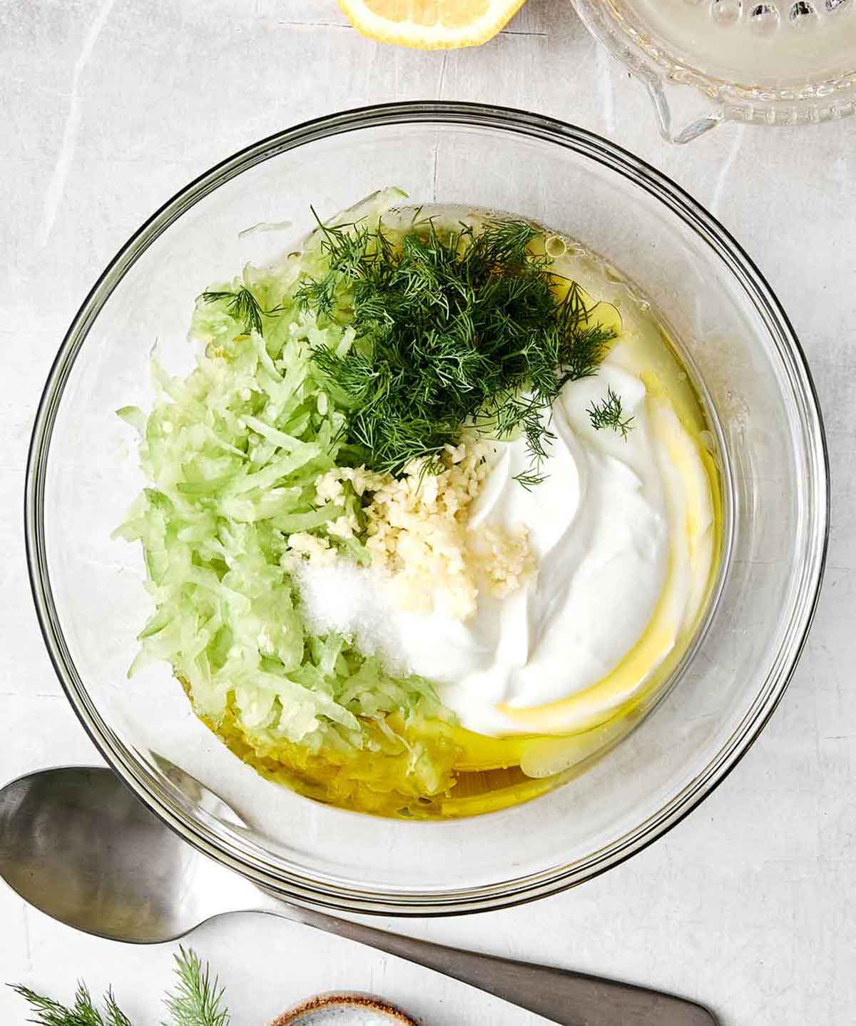 Step two of tzatziki: mix everything together.