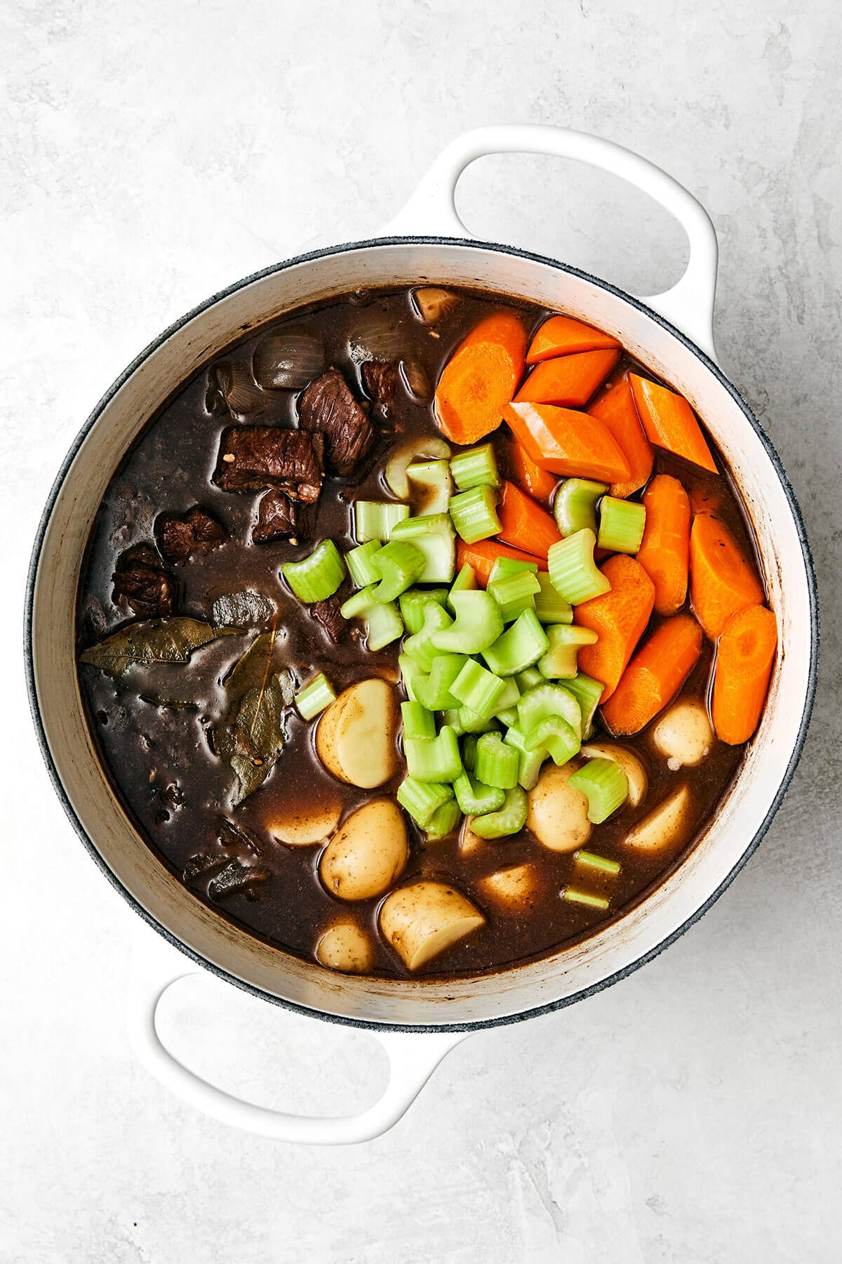 This classic beef stew recipe is a cold-weather one-pot wonder and my favorite for a hearty, comforting, and satisfying meal! Adding veggies into a pot of beef stew