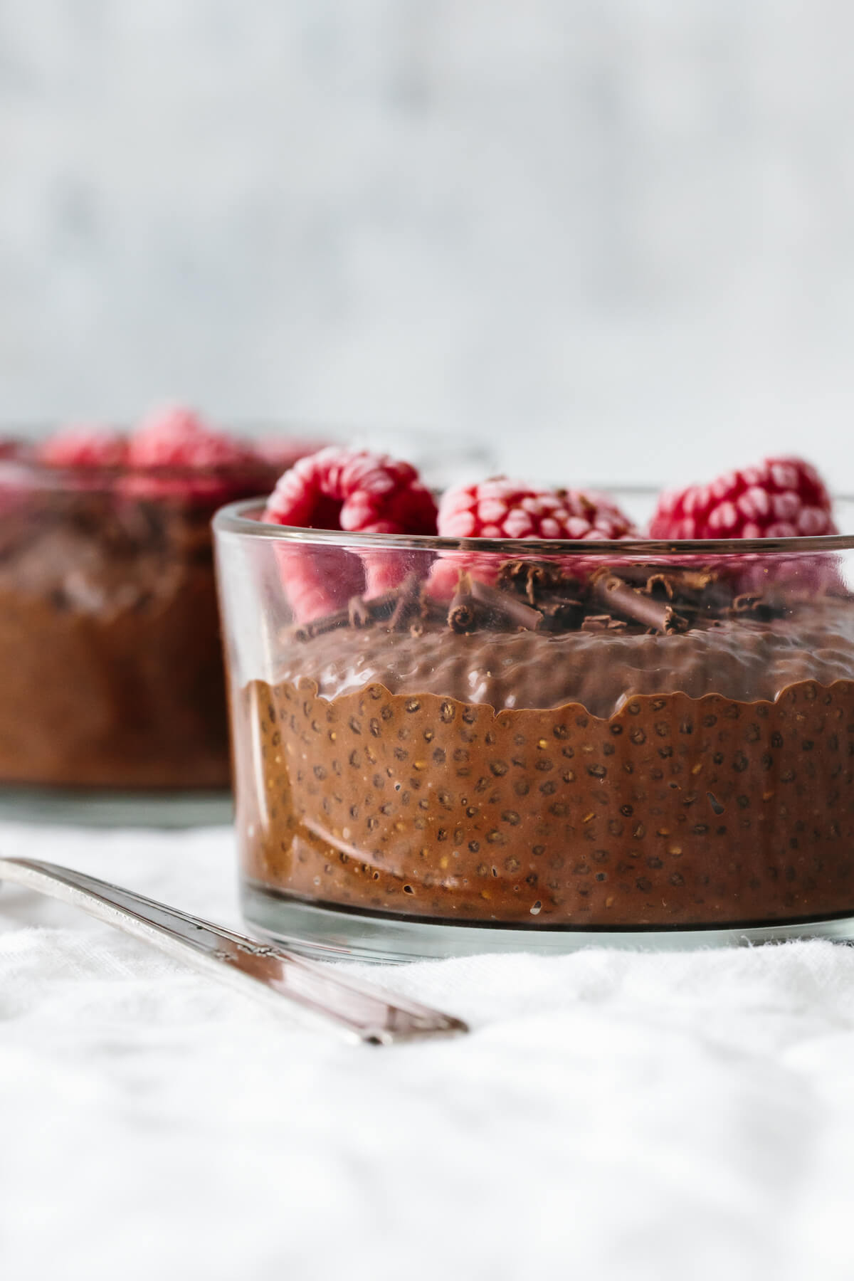 Chocolate chia pudding is so simple and amazingly delicious. It's the easiest healthy dessert recipe you can make with no baking! Chocolate chia pudding with fruit