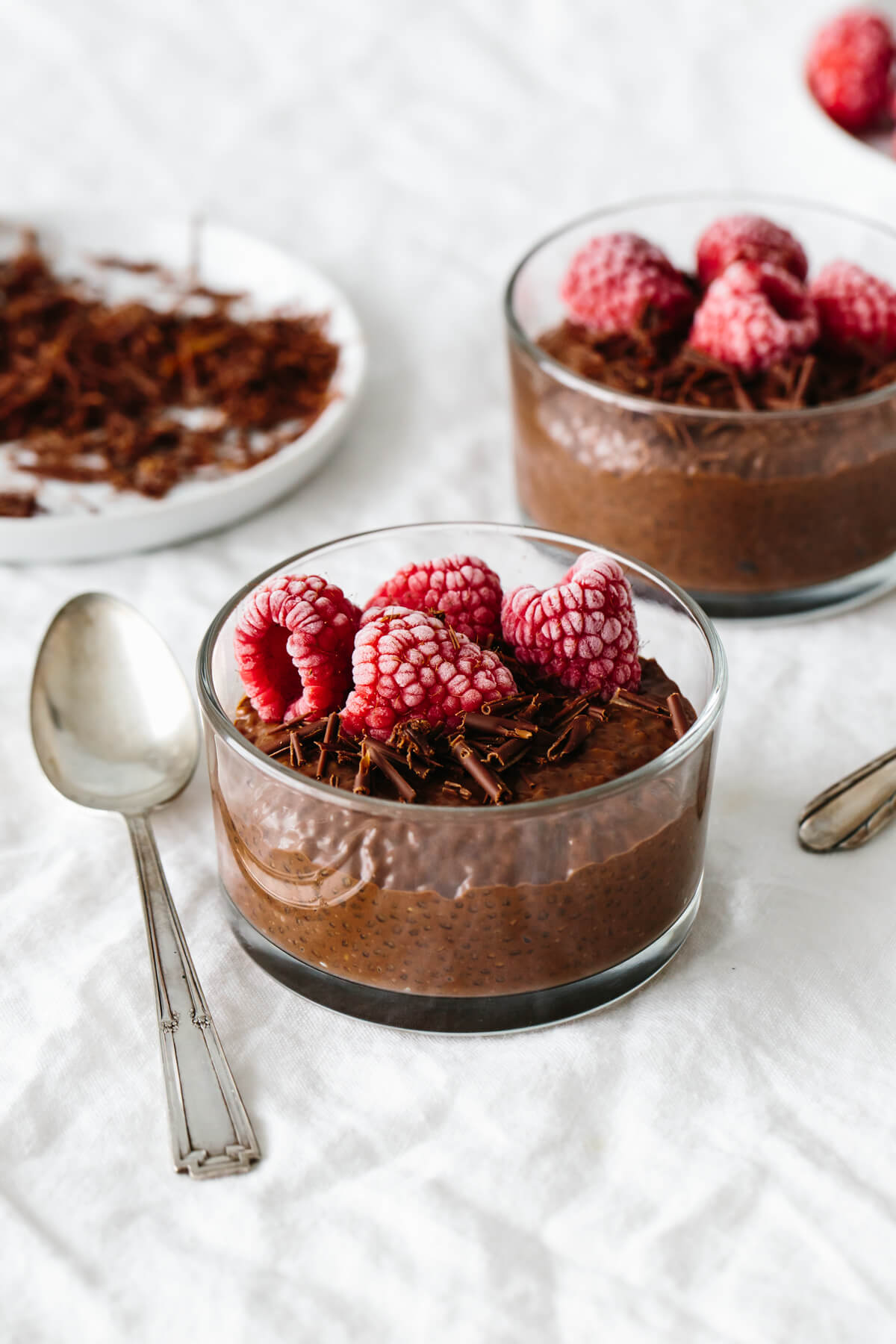 Chocolate chia pudding is so simple and amazingly delicious. It's the easiest healthy dessert recipe you can make with no baking! Two glasses of chocolate chia pudding
