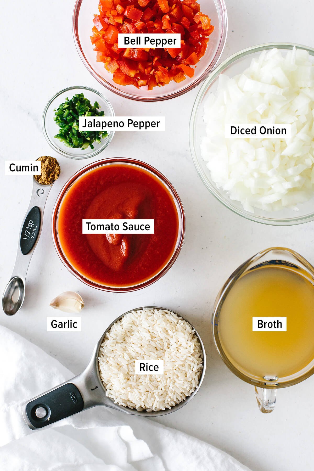 Ingredients for Mexican rice on a table.