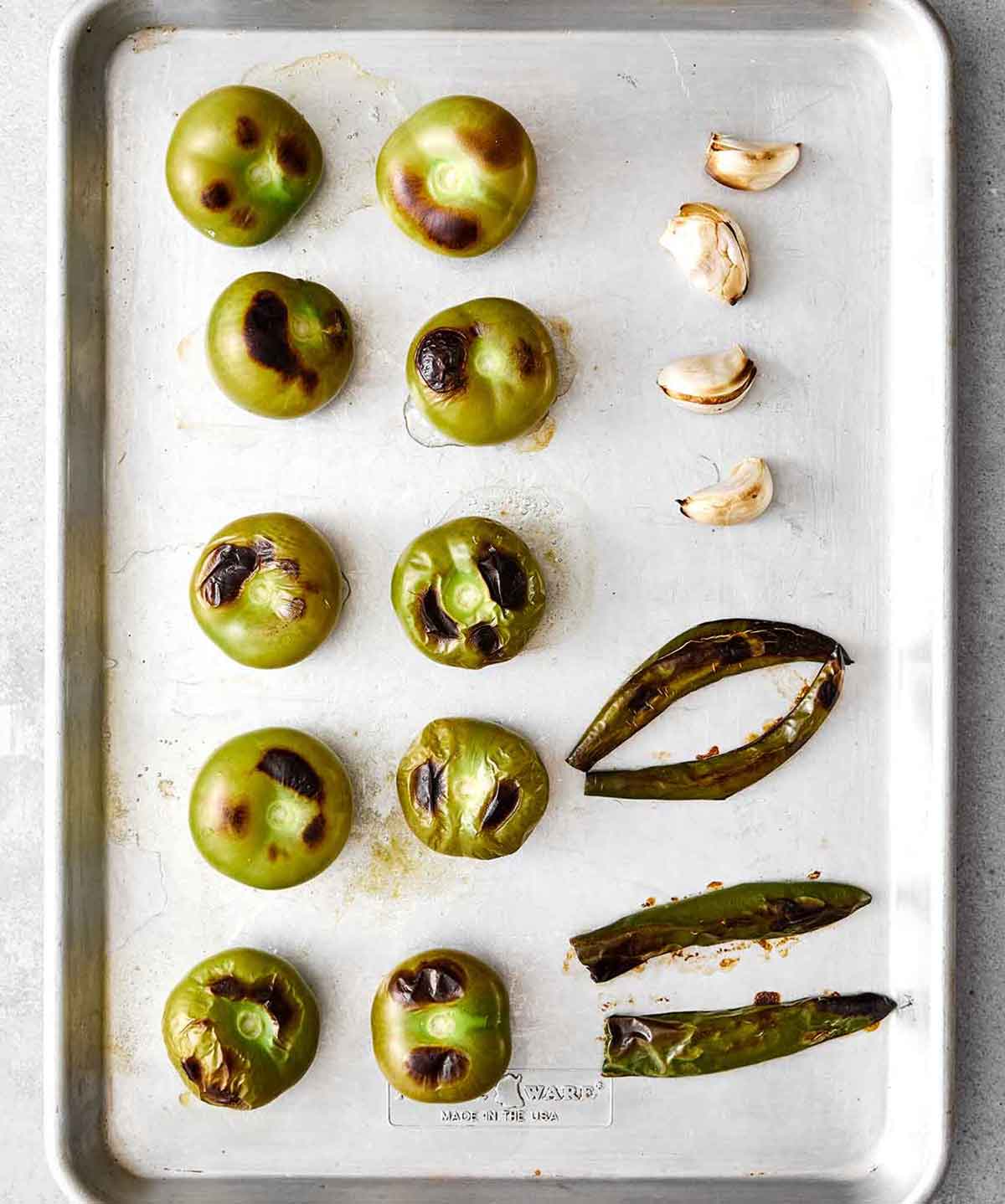 Roasting tomatillos and veggies for salsa verde.