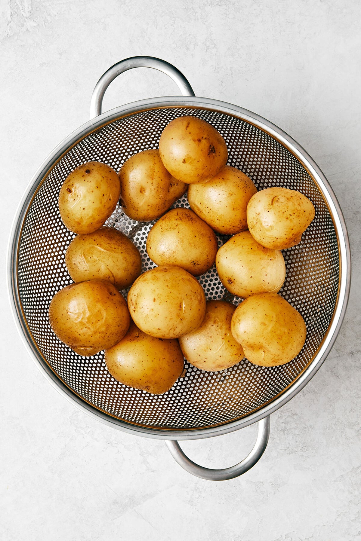 Draining little potatoes