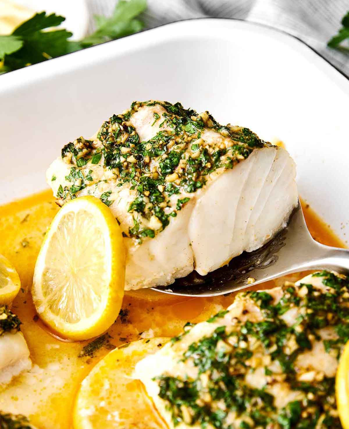 Baked cod with garlic herb butter.