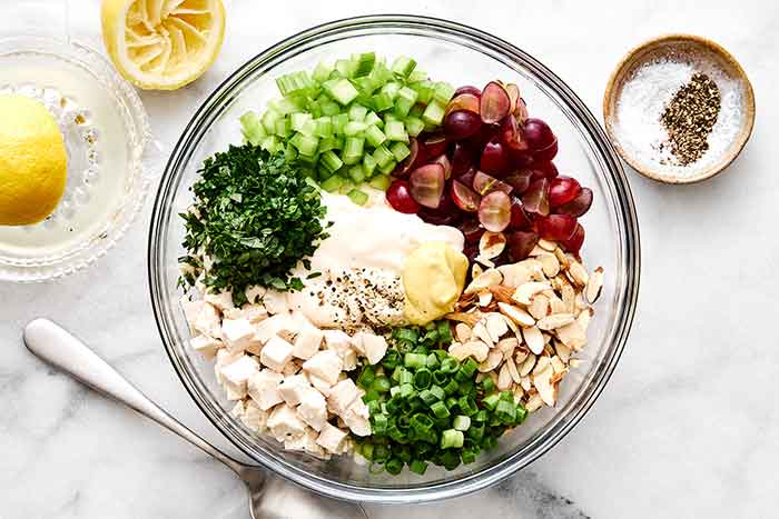 Step four of chicken salad: toss together.