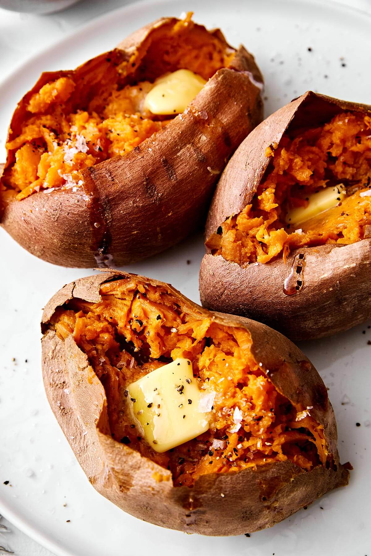 Baked sweet potatoes with butter.