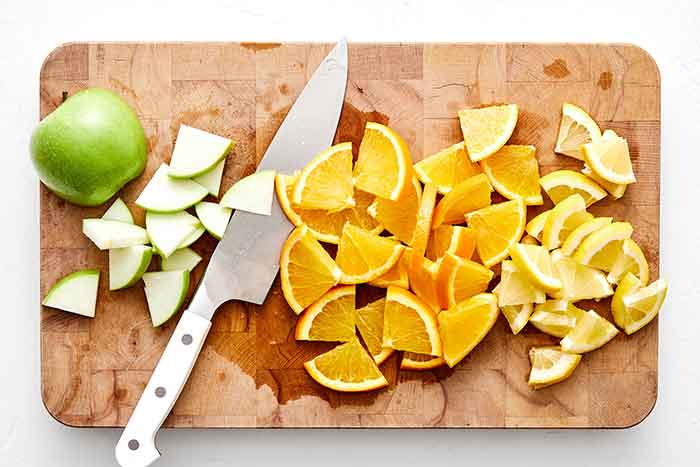 Chopped oranges and apples.