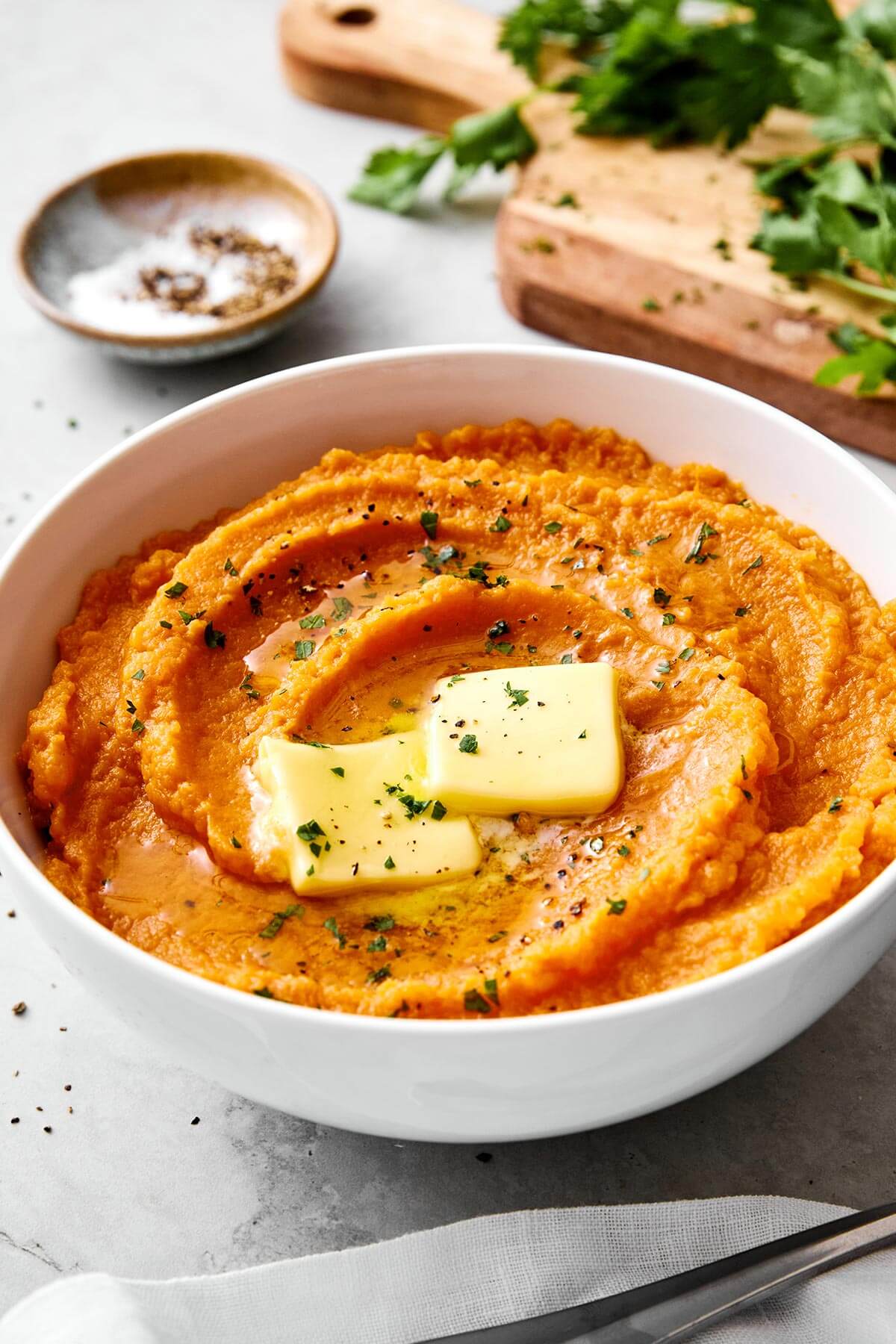 A bowl of mashed sweet potatoes.