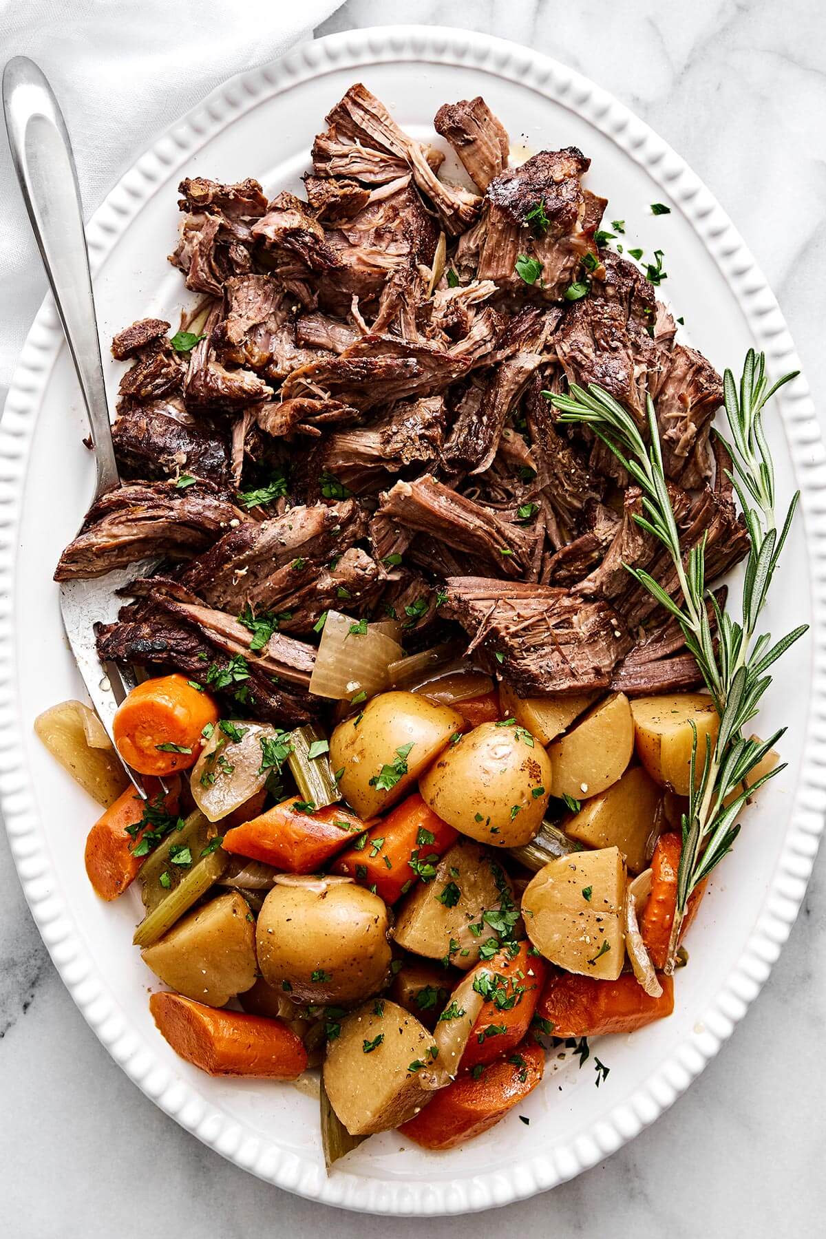 A platter of slow cooker pot roast.