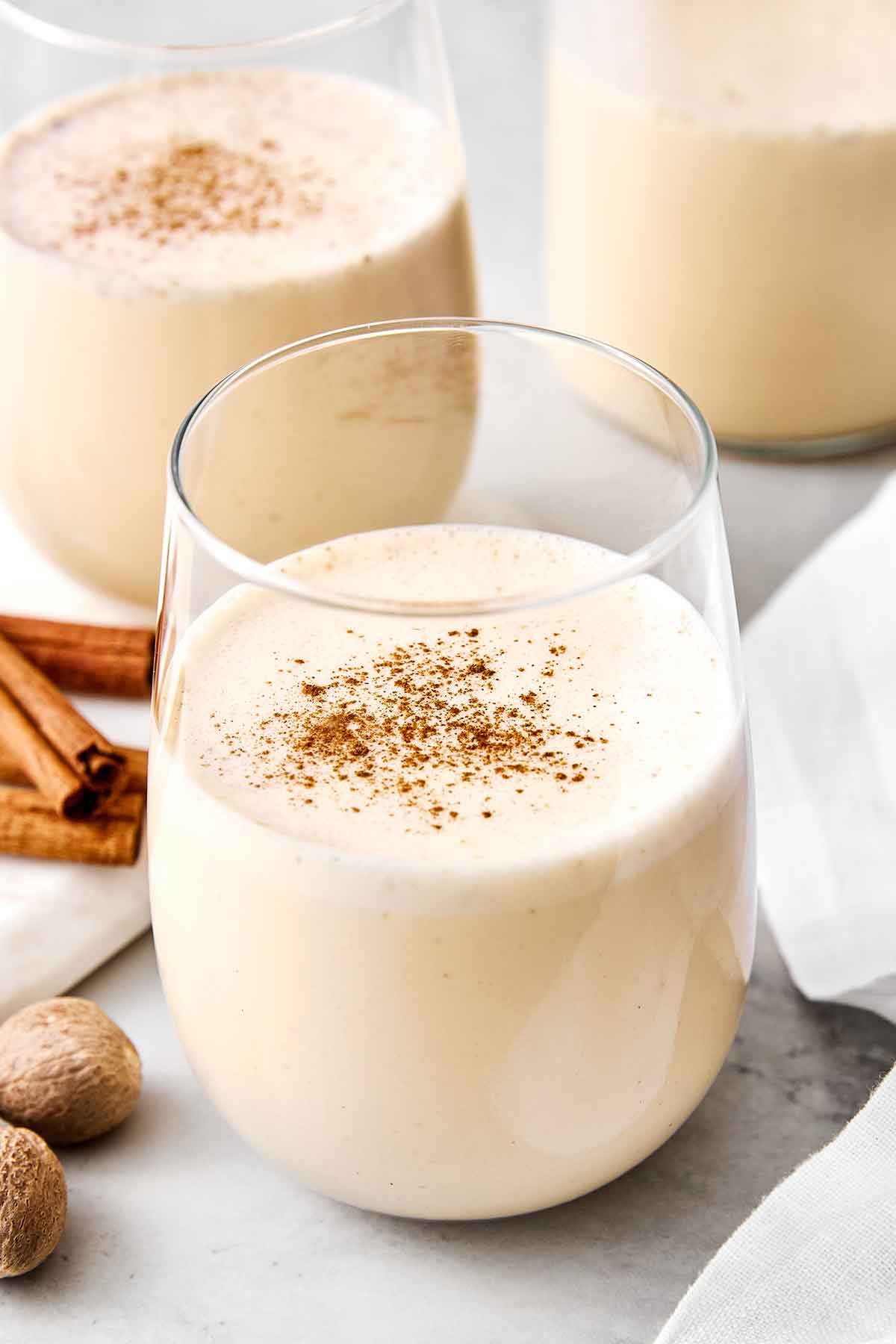 Homemade eggnog in a glass.