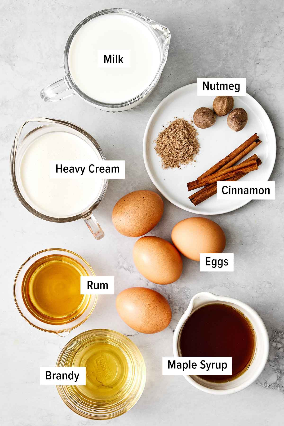 Ingredients for homemade eggnog.