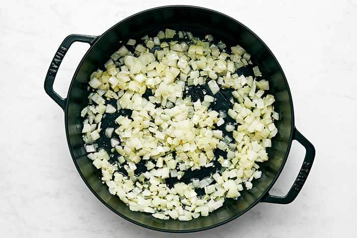 Cooked onions in a skillet.