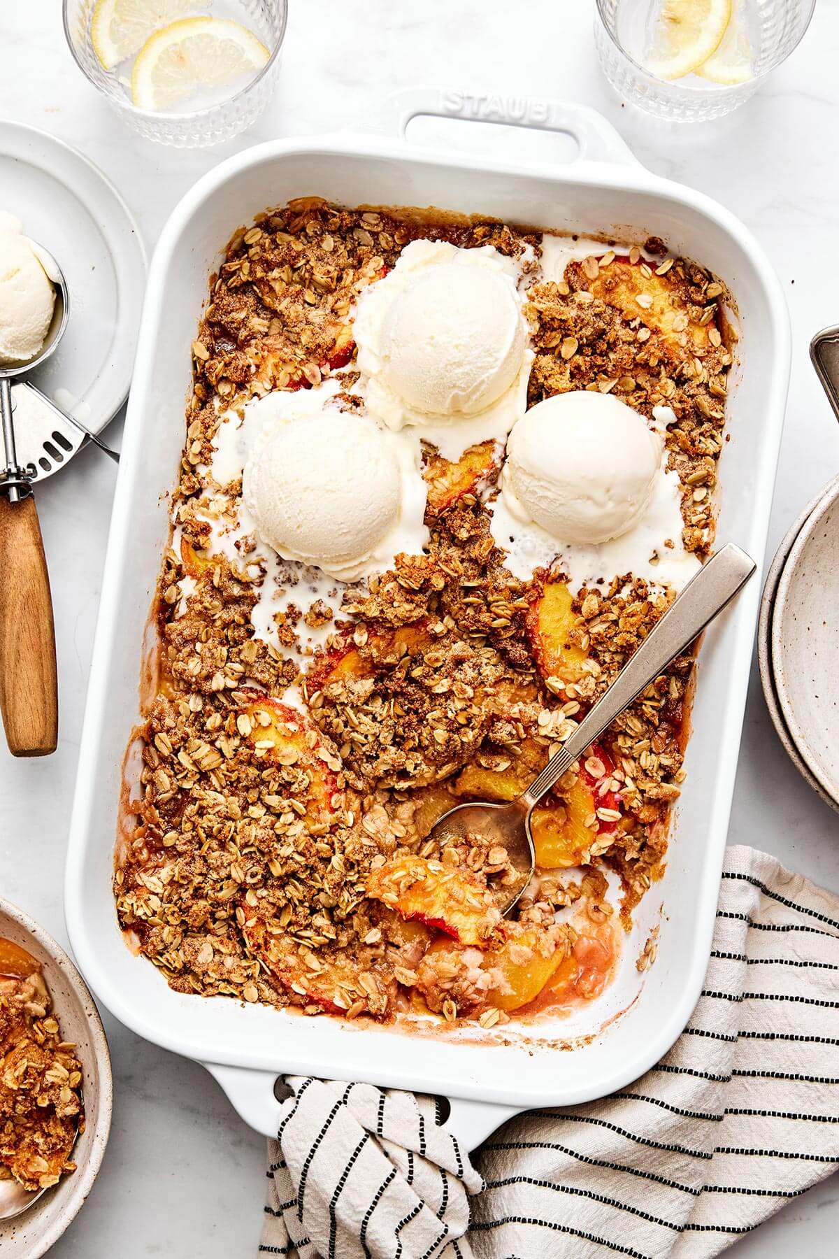 A casserole dish of peach crisp.