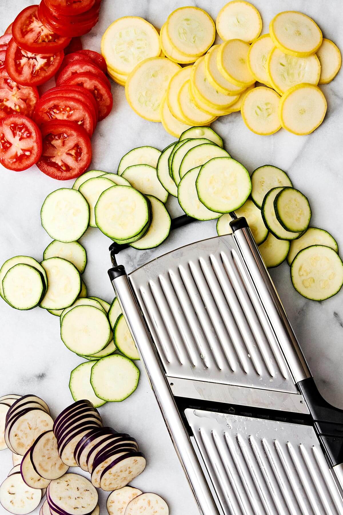 Slicing vegetables with a mandoline.