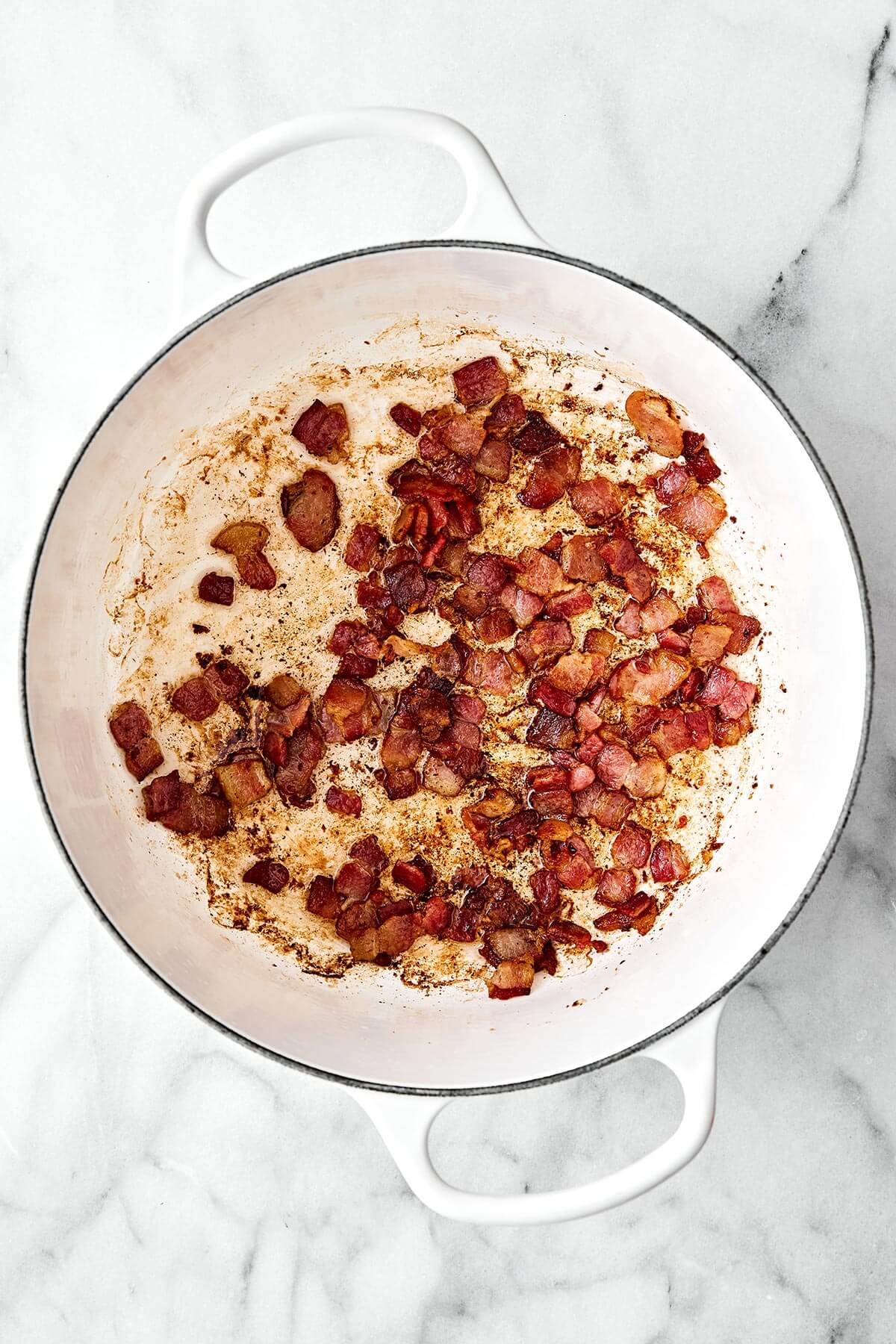 Cooking bacon in a pot.