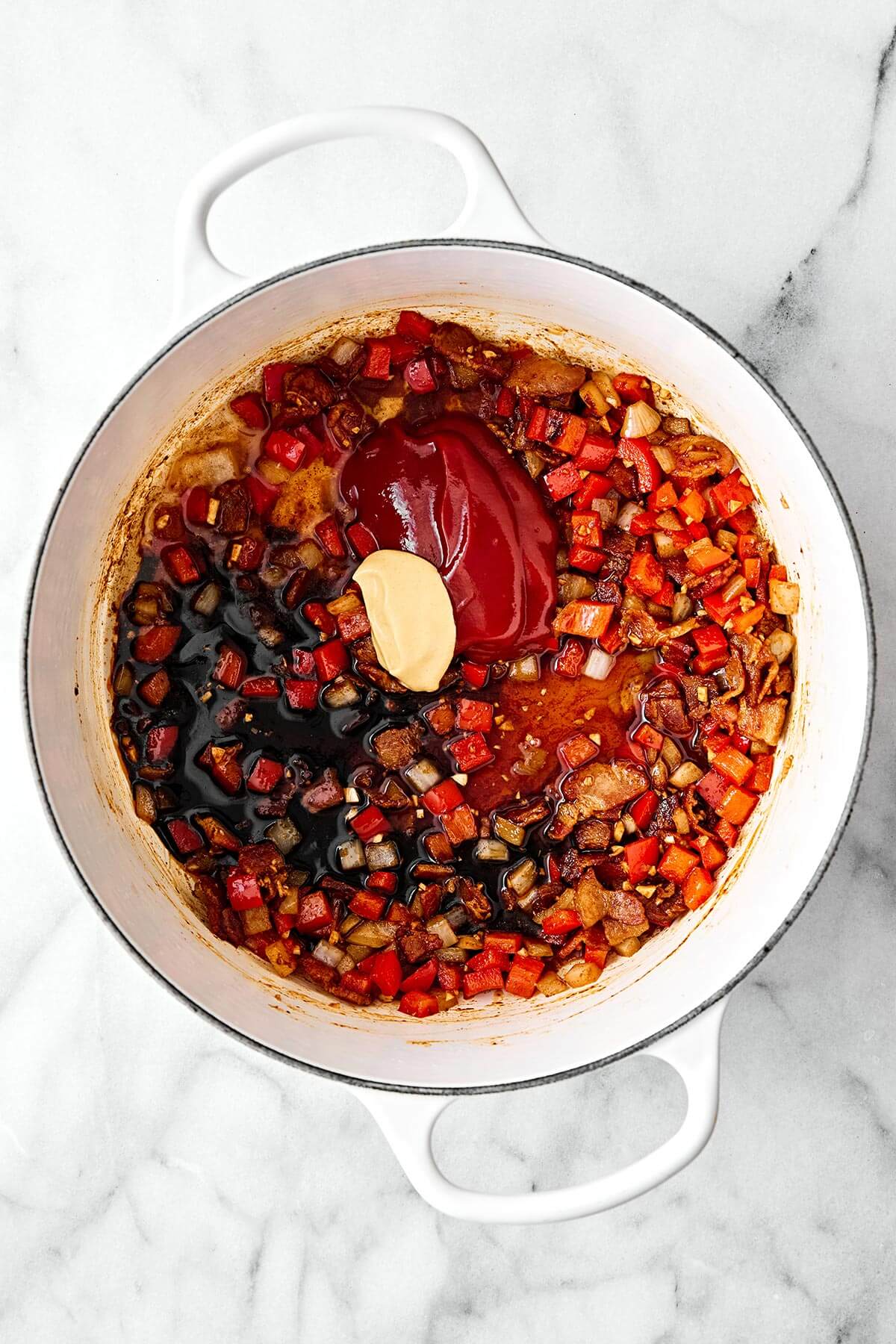 Making baked beans in a pot.