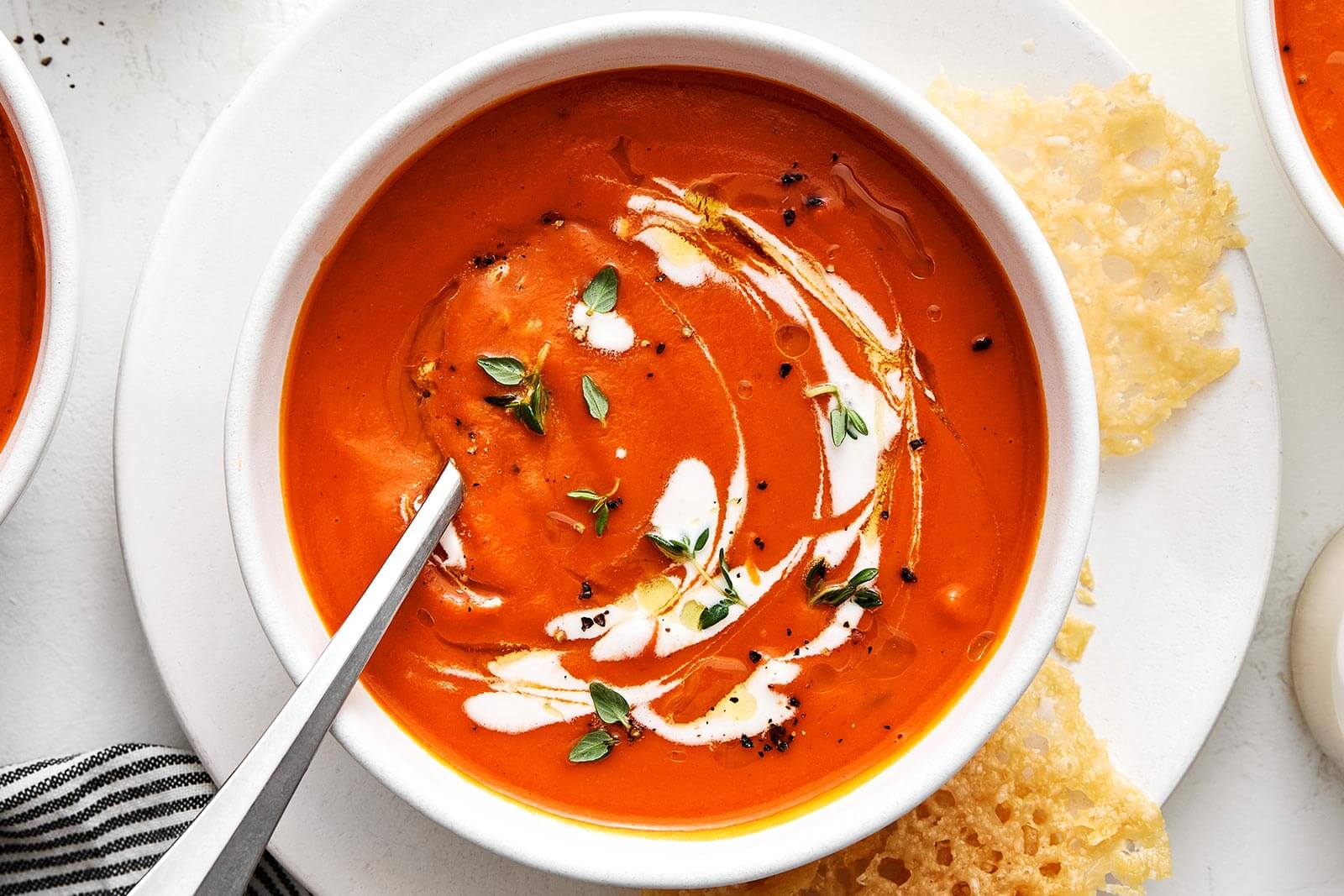 A bowl of creamy tomato soup.