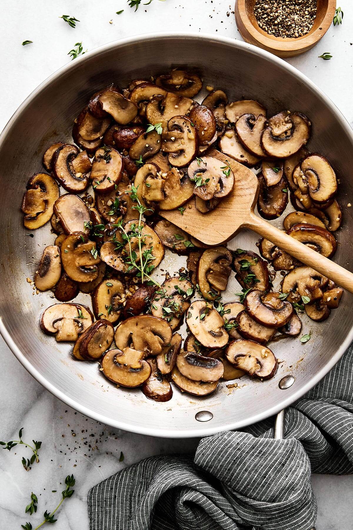 Sautéed mushrooms are the simplest way to add a buttery umami flavor to any meal — especially with steak, burgers, and more! A pan of sauteed mushrooms.