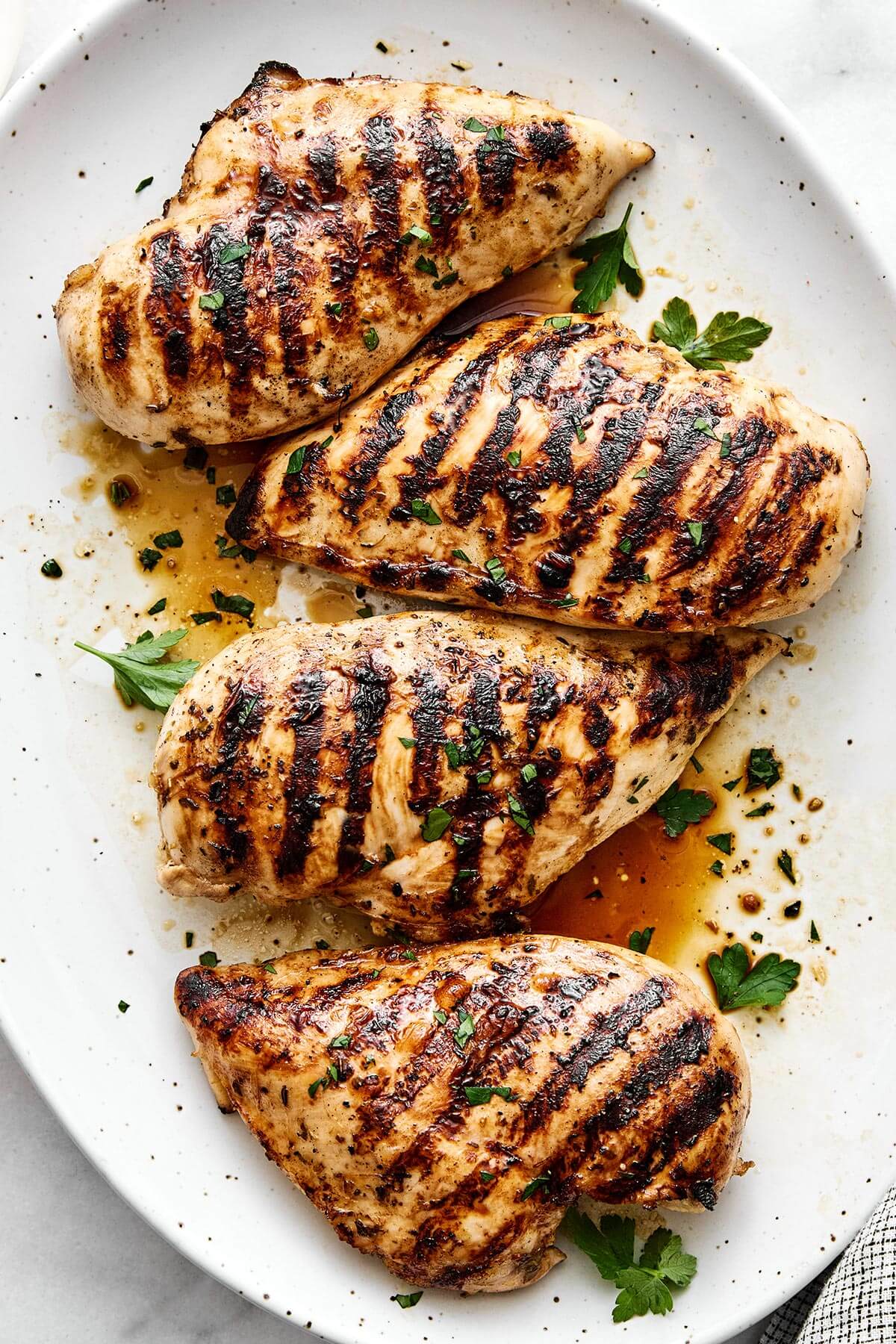 Grilled chicken on a plate.
